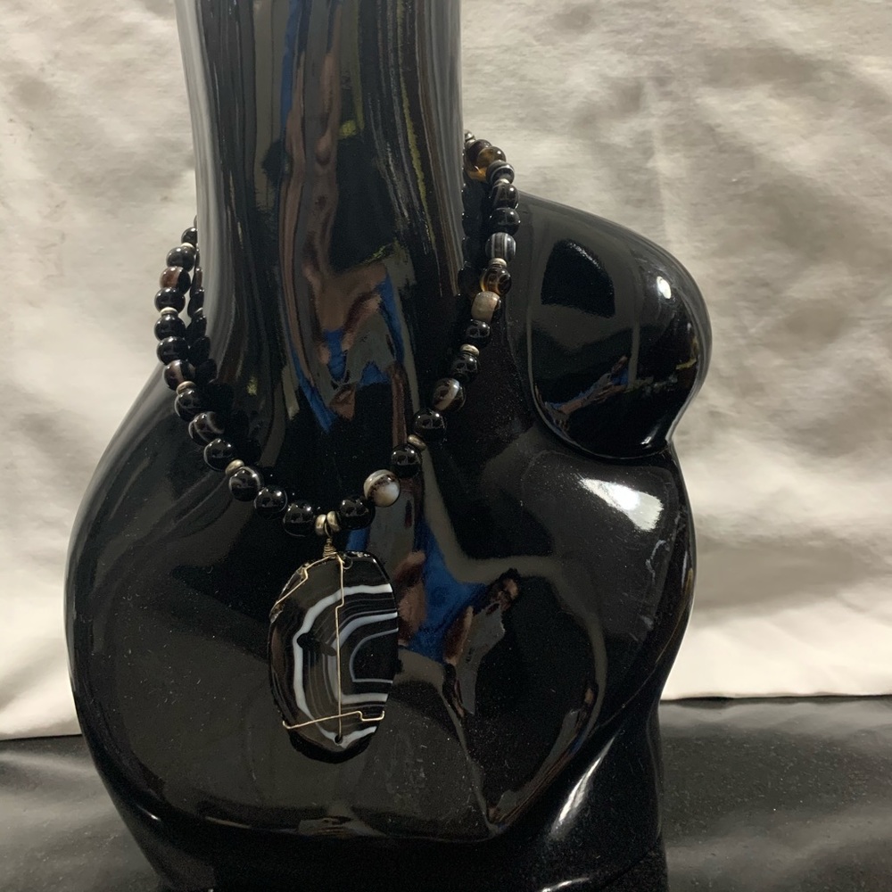 Black stone necklace.